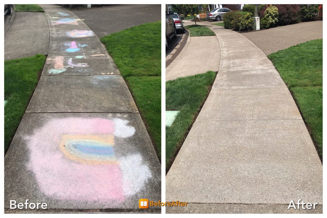 Pressure washing concrete sidewalk